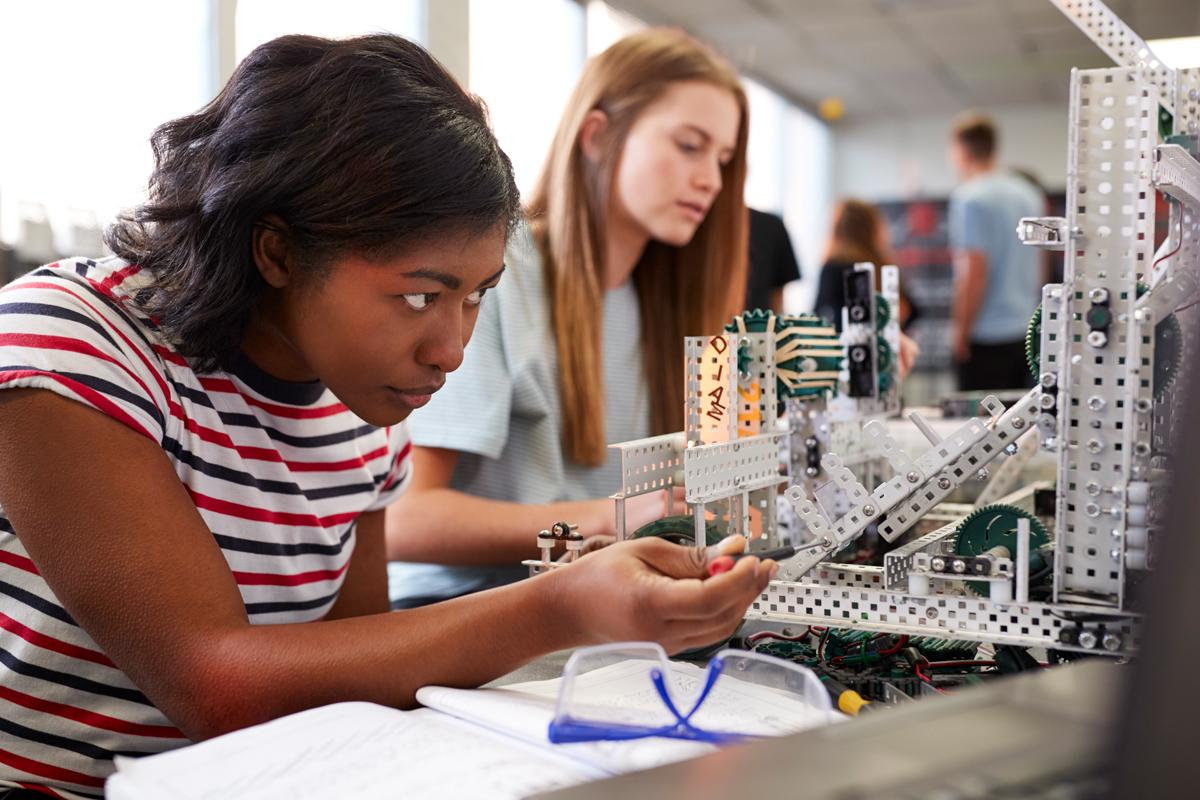 Women In Science & Engineering (WISE) House 2 girls working on a project